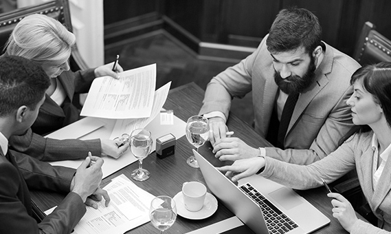 Lawyers discussing a case at a meeting table